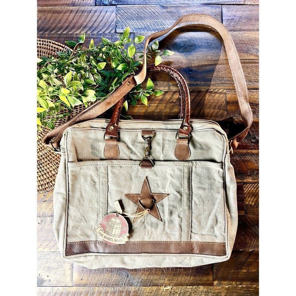 The barrel SHACK Josette Canvas and Leather Messenger Bag womens designer